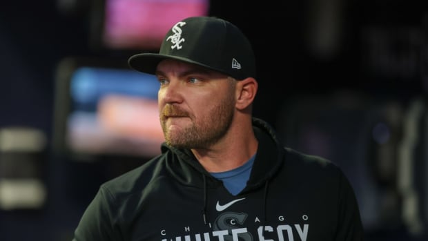 Jul 14, 2023; Atlanta, Georgia, USA; Chicago White Sox relief pitcher Liam Hendriks (31) in the dugout against the Atlanta Braves in the fifth inning at Truist Park.